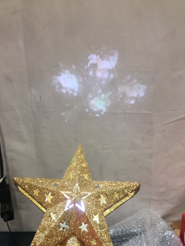 Photo 2 of CHRISTMAS TREE TOPPER PROJECTOR GOLD
BOX DAMAGED DUE TO EXPOSURE