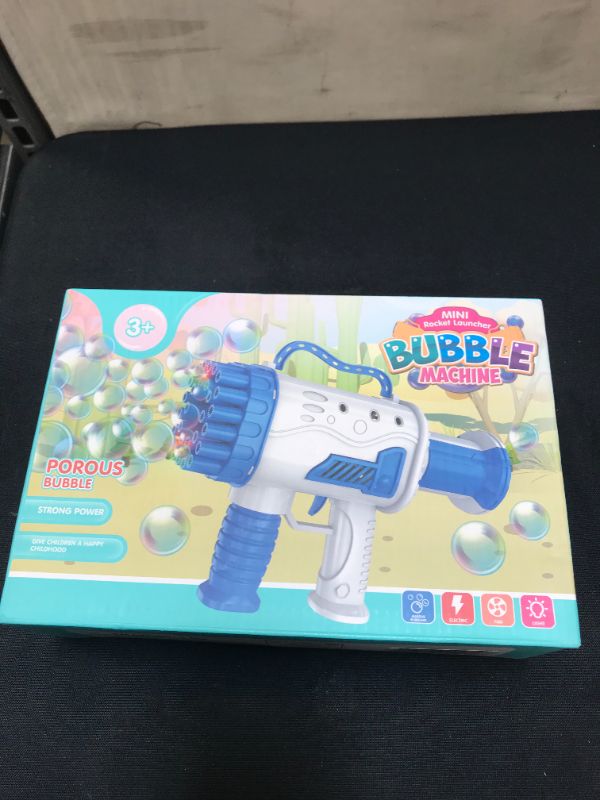 Photo 2 of Bubble Gun, LAMGUU Automatic Bubble Machine Gun for Toddlers with Led Light 1 Bottle Solution and 10 Packs Refill 5000+ Bubbles Per Minute 360° Bubbles Maker for Kids Summer Toys Birthday Gift (Blue)
