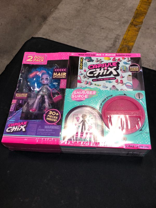 Photo 2 of Capsule Chix Shimmer Surge 2 Pack, 4.5 inch Small Doll with Capsule Machine Unboxing and Mix and Match Fashions and Accessories, Multicolor (59227)
