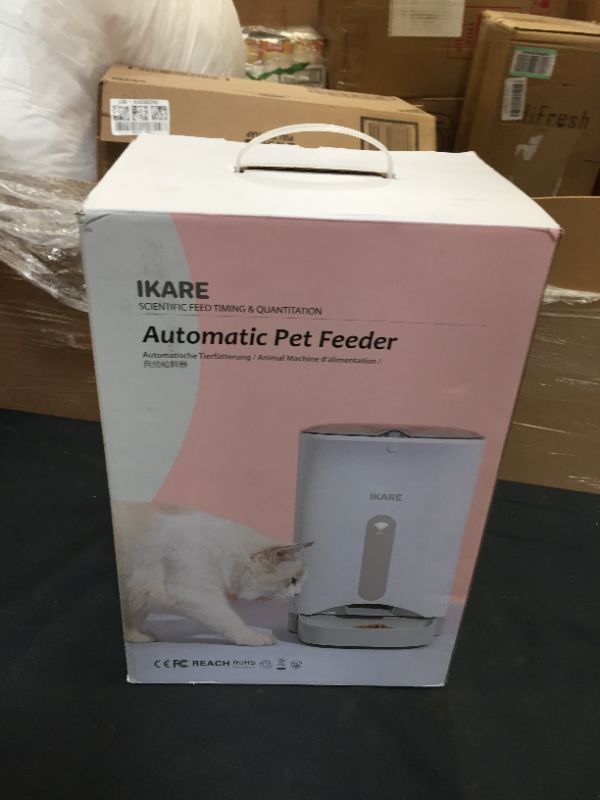 Photo 1 of Battery operated automatic pet feeder *power cord NOT included* 