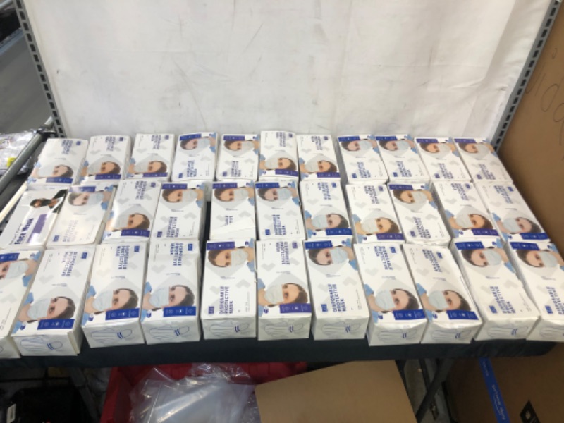 Photo 1 of Box lot  -- 33 boxes of masks