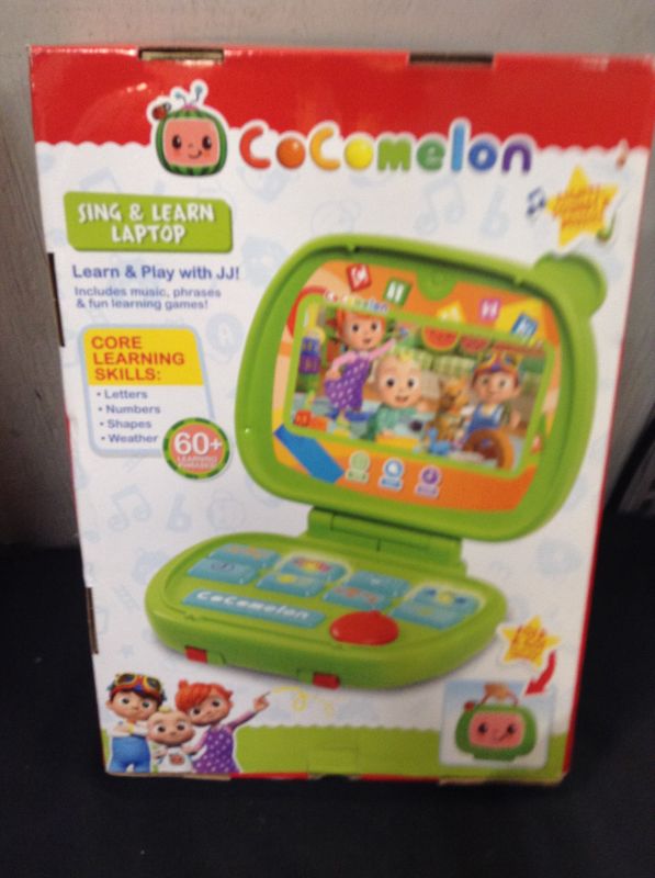 Photo 1 of CoComelon Sing and Learn Laptop Toy for Kids, Lights, Sounds and Music Encourages Letter, Number, Shape and Animal Recognition, by Just Play---factory sealed