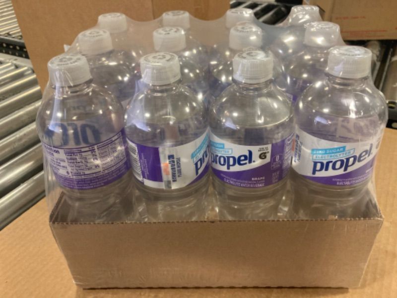 Photo 2 of 12pcs---Propel, Grape, Zero Calorie Sports Drinking Water With Electrolytes  24fl oz-----exp date 04/07/2023