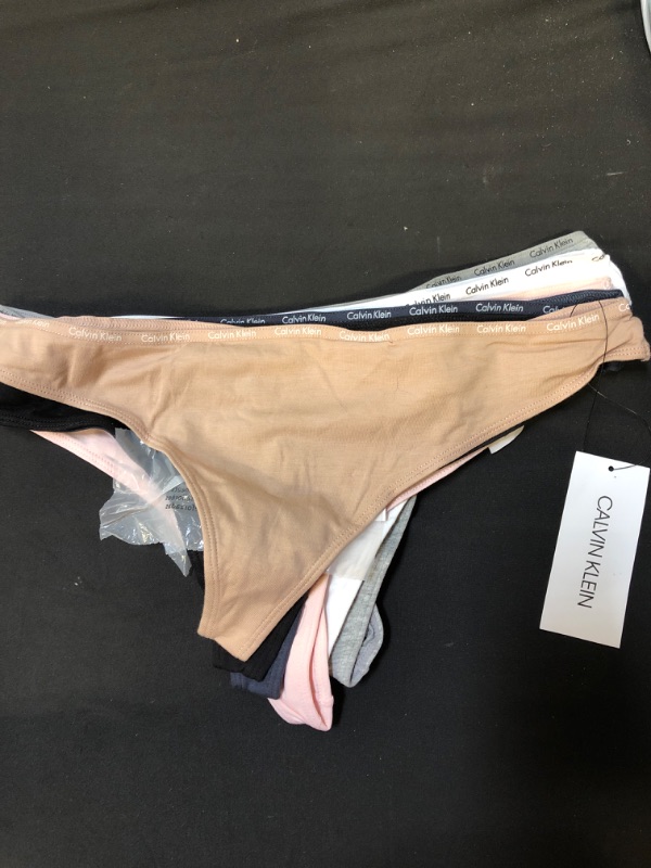 Photo 2 of Calvin Klein Women's Signature Cotton Logo Thong Panties, Multipack
SIXE XL