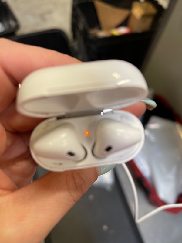 Photo 2 of Apple AirPods (2nd Generation) Wireless Earbuds with Lightning Charging Case Included. Over 24 Hours of Battery Life, Effortless Setup. Bluetooth Headphones for iPhone
