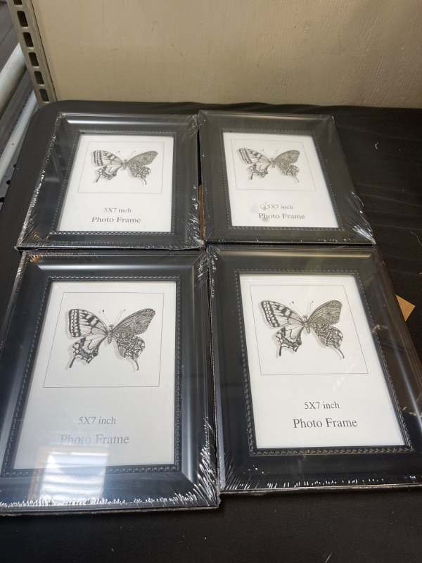 Photo 1 of 4 PIECE BLACK WOODEN  DECORATIVE FRAMES 