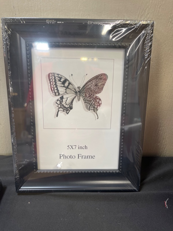 Photo 1 of 4 PIECE BLACK WOODEN  DECORATIVE FRAMES 