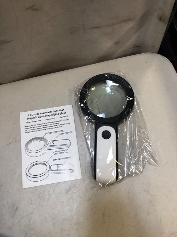 Photo 2 of   magnifying glass with light 