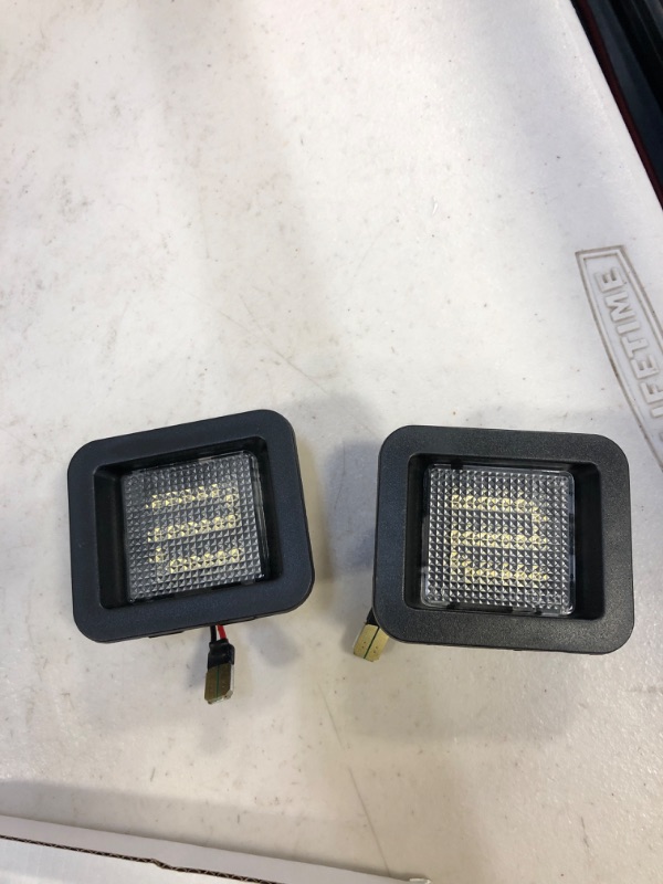 Photo 1 of 2pcs licence plate lights for car 
(model unknown)