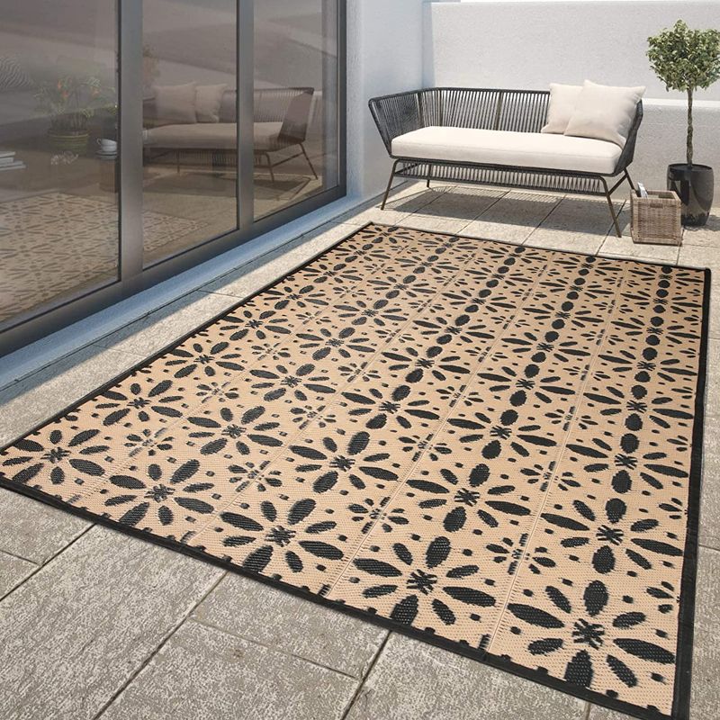 Photo 1 of AOLEBA Reversible Outdoor Rug Mat, Plastic Straw Rug, Outdoor Patio Rug, 5'x8' Black and Beige Flower Outdoor Rug, Area Rugs for Outdoor, Camping, RV, Patio, Picnic, Beach, Backyard, Deck, Trailer
