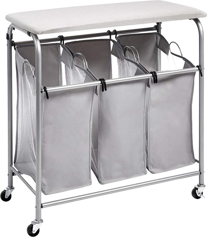 Photo 1 of Amazon Basics 3-Bag Laundry Sorter with Ironing Board Top, Grey-----missing some hardware 
