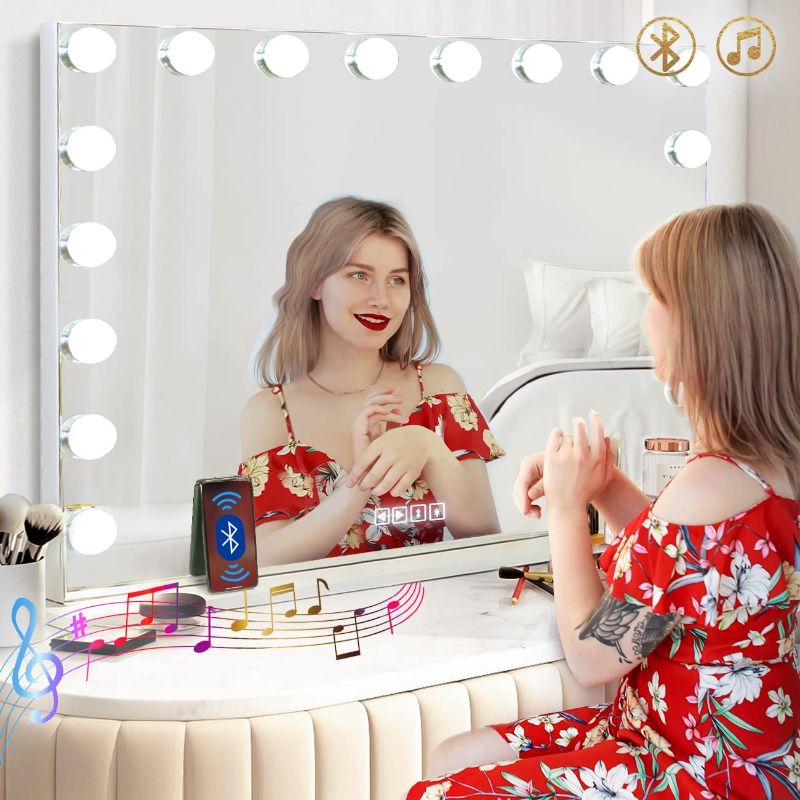 Photo 1 of Hansong Vanity Mirror with Lights and Bluetooth Extra Large Hollywood Makeup Mirror with 18 pcs LED Bulbs Lighted Vanity Makeup Mirror with USB Charging, 3 Color Lighting Modes Tabletop or Wall Mount---missing power cord unable to test 
