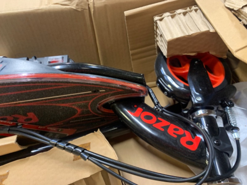 Photo 7 of Razor Power Core E90 Electric Scooter, Box Packaging Badly Damaged, Moderate Use, Scratches and Scuffs on item, Scooter Turns on. 