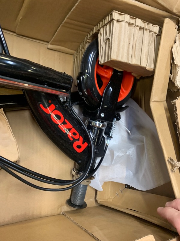 Photo 4 of Razor Power Core E90 Electric Scooter, Box Packaging Badly Damaged, Moderate Use, Scratches and Scuffs on item, Scooter Turns on. 