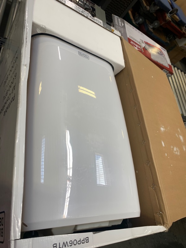 Photo 3 of 10,000 BTU; 6,000 BTU (SACC/CEC) Portable Air Conditioner with Double Motor, Dehumidifier and Remote, White, Box Packaging Damaged, Moderate Use, Scratches and Scuffs on item
