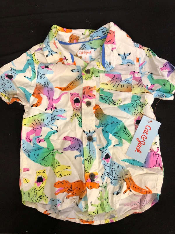 Photo 1 of CAT & JACK TODDLER BUTTON UP DINO PRINT, SIZE 2T ( SMALL DOT/ STAIN NEAR COLLAR ) 