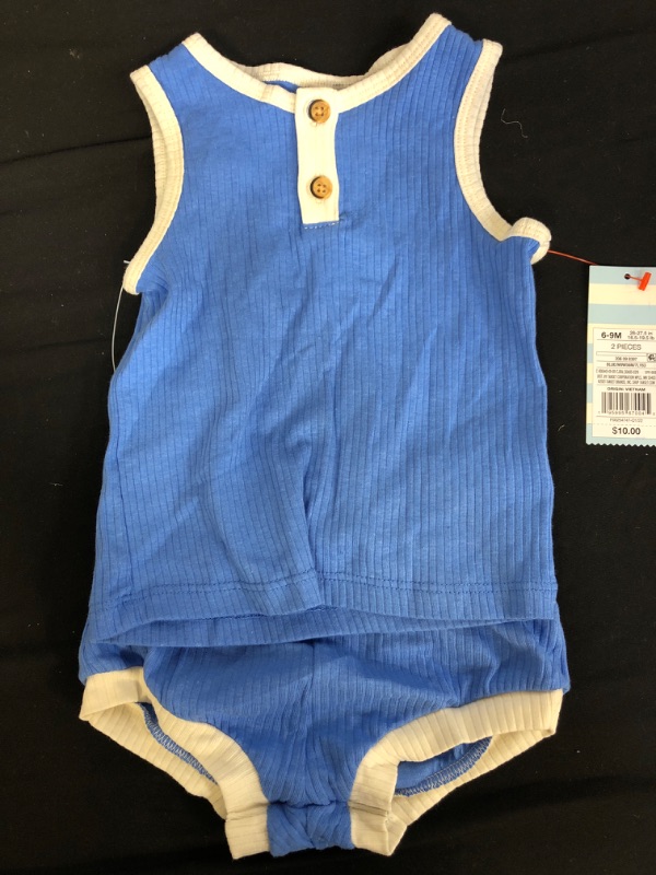 Photo 2 of Baby 2pc Ribbed Henley Top & Bottom Set - Cat & Jack™ SIZE 6-9M