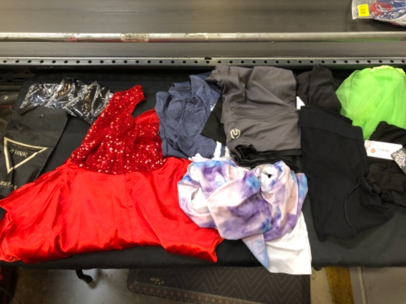 Photo 1 of Assorted clothing items, various sizes and styles