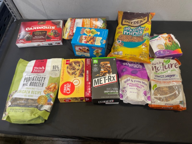 Photo 1 of bag lopt of misc people and pet snacks sold as is