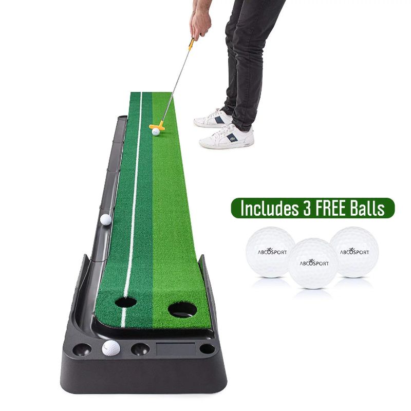 Photo 1 of Abcosport Indoor Golf Putting Practice Mat – Auto Ball Return Function – Life-Like Portable Golf Court Real-Like Grass – Extra-Long Golf Mat – 3 Bonus Balls
