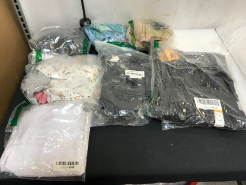 Photo 1 of ASSORTED USED CLOTHING BAG LOT, VARIOUS SIZES SOLD AS IS