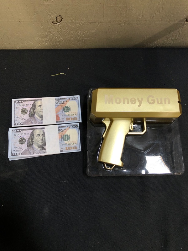 Photo 1 of Newest Super Gun Shooter Playing Spary Make it Rain Cash Gun Prop Bill Dispenser Shooter (Gold)
