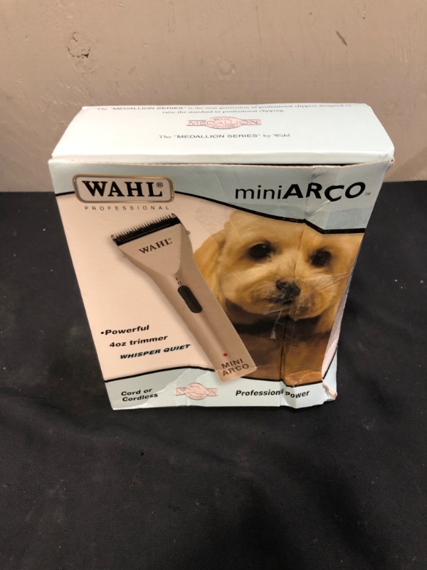Photo 1 of Wahl Professional Animal MiniArco Corded/Cordless Pet, Dog, Cat, and Horse Trimmer Kit (#8787-450A) (ITEM IS NEW, BOX IS DAMAGED)
