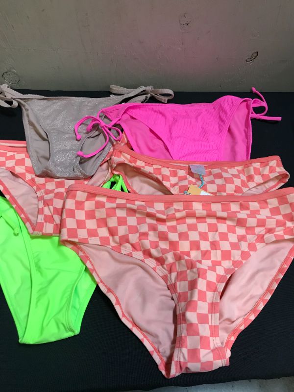 Photo 1 of WOMENS PACK OF VARIOUS SIZE SWIMMING BOTTOMS 