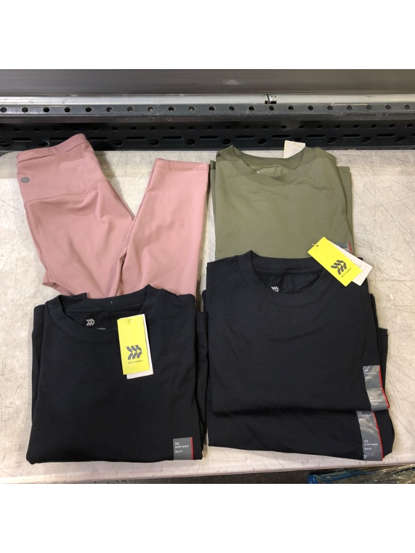 Photo 1 of all in motion XS bundle (3 black shirts, 1 dark green shirt, 1 pair of pink tights)