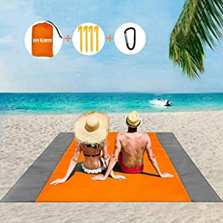 Photo 1 of LIN KANG Sand Proof Beach Blanket Extra Large 79" x 83" Sand Free Waterproof Quick Dry Beach Blanket for 2-8 Adults, Lightweight Foldable Outdoor Picnic Blanket with 4 Stakes and 4 Pockets on Sides corners