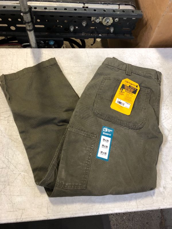 Photo 2 of Carhartt Men's Rugged Flex Relaxed Fit Heavyweight Double-Front Utility Logger Jean 36W x 30L Moss