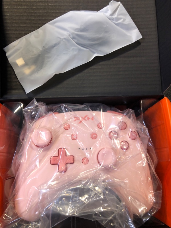 Photo 1 of PXN Wireless Switch Controller for Nintendo Switch/Switch Lite/OLED, Support iOS(16 Version Only) Switch Pro Controller with Turbo, Wake-up, NFC, Motion, Vibration Wireless Switch Controller-Pink
