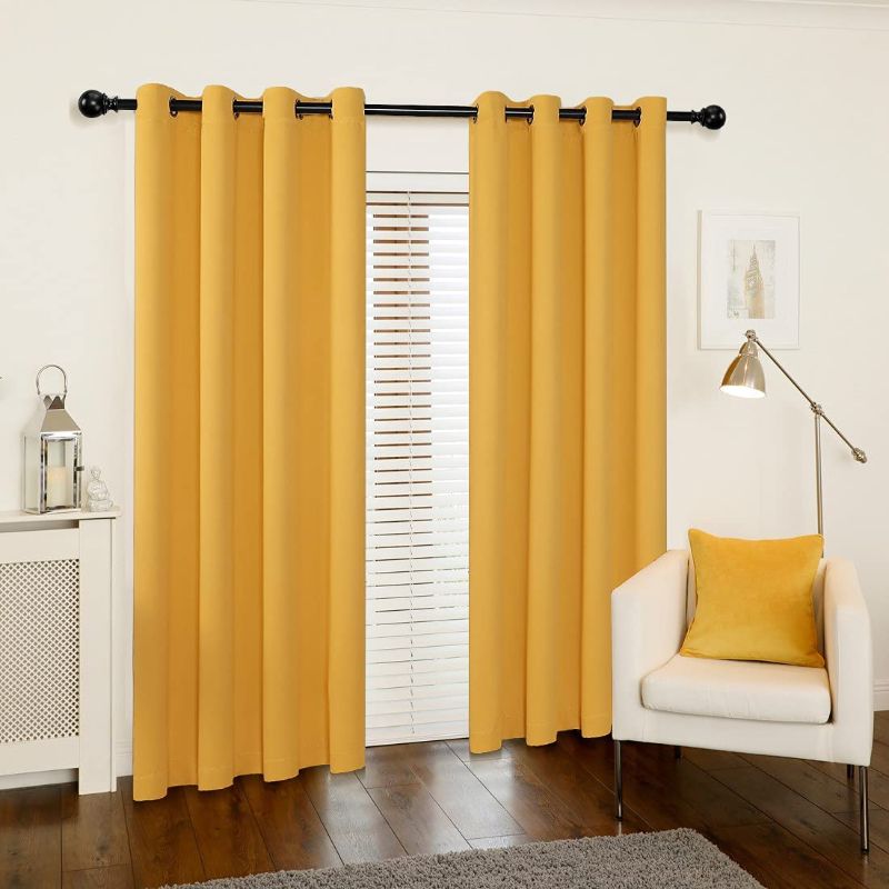 Photo 1 of Akarise Blackout Curtains for Bedroom - Window Drapes for Living Room with Room Darkening Noise Reducing Grommet Top Thermal Insulated Curtains, 2 Panels (Yellow, 52x108 inch)
