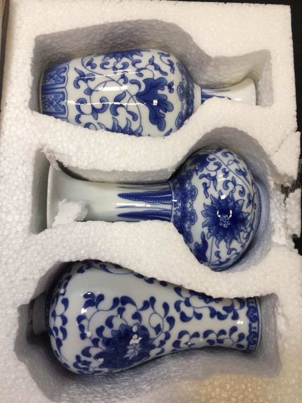 Photo 1 of 3 PIECE VASE WHITE AND BLUE 