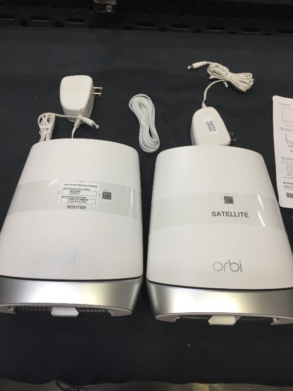 Photo 2 of Orbi AX4200 Tri-Band WiFi 6 Mesh System with Router + 1 Satellite Extender - 4.2Gbps --PACKAGING IS DAMAGED--