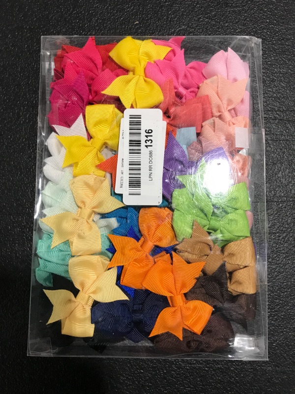 Photo 1 of ASSORTED HAIR CLIP BOWS. VARIOUS COLORS. 