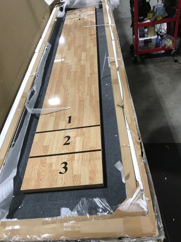 Photo 2 of Atomic 9’ LED Shuffleboard Tables with Poly-Coated Playing Surface for Smooth, Fast Puck Action and Pedestal Legs with Levelers for Optimum Stability and Level Play Glide 9' Table LED Shuffleboard Tables