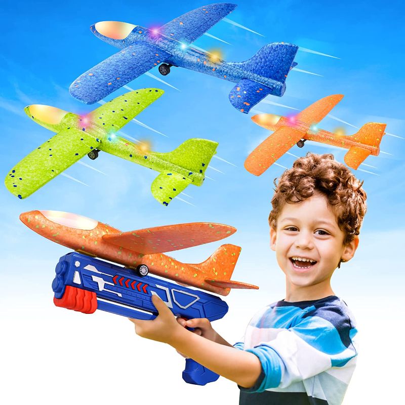 Photo 1 of Airplane Launcher Toys, 2 Flight Modes LED Foam Glider Catapult Plane Toy for Boys, Outdoor Flying Toys Birthday Gifts for Boys Girls 4 5 6 7 8 9 10 11 12 Year Old