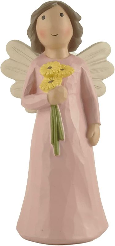 Photo 2 of Angel Statue Holding Sunflower Birthday Party Decorations, 5.79" Tall, Pink