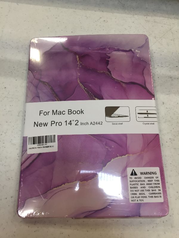 Photo 1 of mack book new pro 14.2' case