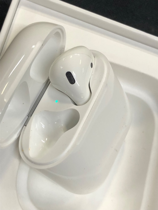 Photo 3 of Apple AirPods (2nd Generation) Wireless Earbuds with Lightning Charging Case Included. Over 24 Hours of Battery Life, Effortless Setup. Bluetooth Headphones for iPhone
