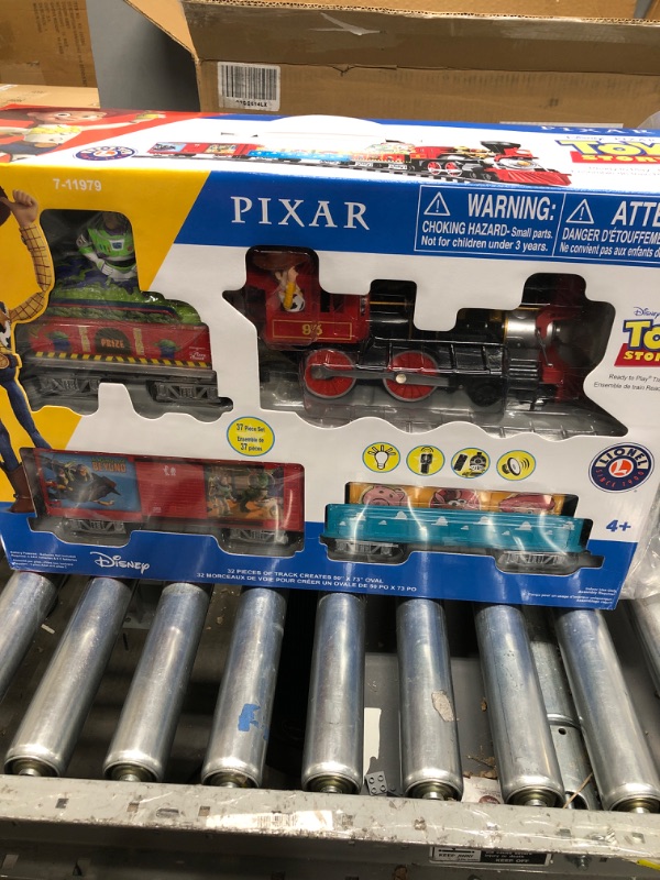 Photo 1 of Lionel Disney Pixar's Toy Story Ready-to-Play Battery Powered Model Train Set with Remote Ready to Play Set