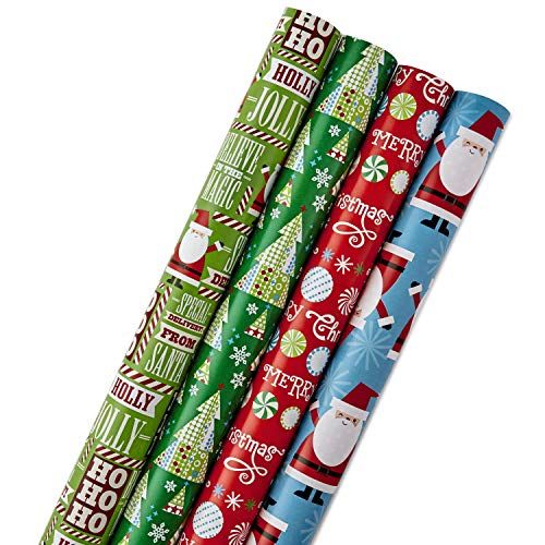 Photo 1 of Hallmark Reversible Christmas Wrapping Paper Bundle for Kids (Pack of 4, 150 Sq. Ft. Ttl.) Santa, Trees, Red, Blue, Green
