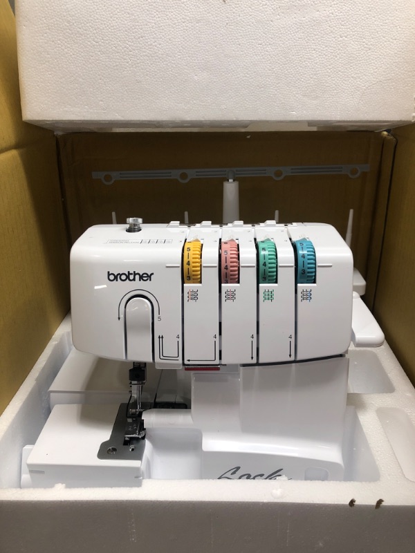 Photo 3 of Brother Serger, 1034D, Heavy-Duty Metal Frame Overlock Machine, 1,300 Stitches Per Minute, Removeable Trim Trap, 3 Included Accessory Feet,White