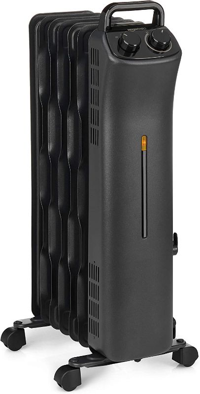 Photo 4 of Amazon Basics Portable Radiator Heater with 7 Wavy Fins, Manual Control, Black, 1500W
