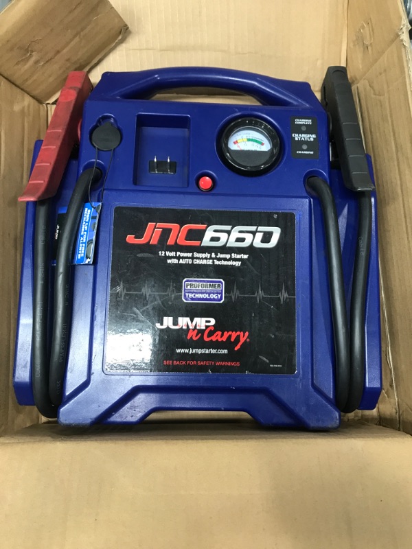 Photo 1 of Clore Automotive Jump-N-Carry JNC660 1700 Peak Amp 12 Volt Jump Starter , Blue