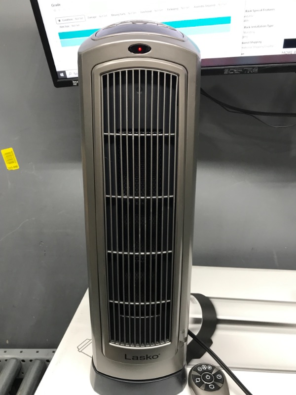 Photo 1 of *** TESTED***Lasko Oscillating Digital Ceramic Tower Heater for Home with Adjustable Thermostat, Timer and Remote Control, 23 Inches, 1500W, Silver, 755320
