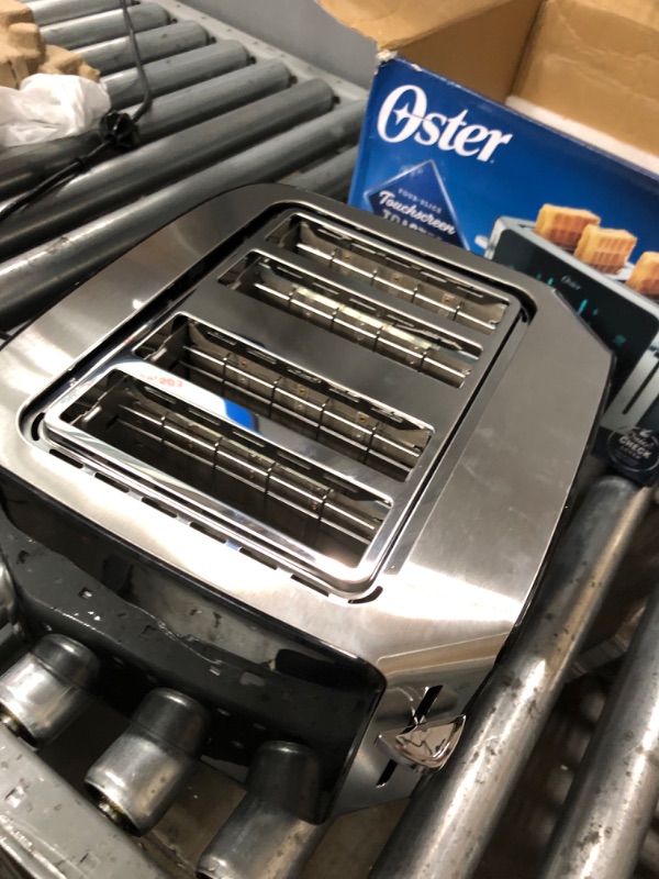 Photo 3 of **toaster only**
Oster 4-Slice Toaster, Touch Screen with 6 Shade Settings and Digital Timer, Black/Stainless Steel & Electric Wine Opener, Foil Cutter, Wine Pourer and Vacuum Wine Stoppers, Black 4-Slice Toaster + Wine Opener, Black