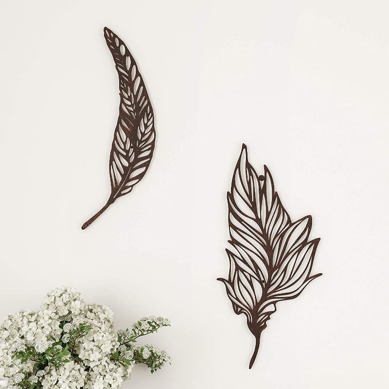 Photo 1 of Home Lavish Decor-Set of Two Metal Feather Hanging Wall Art Laser Cut Contemporary Nature Sculpture for Living Room, Bedroom, Kitchen (Brown), 9.25” L x .05" W x 19.75" H
