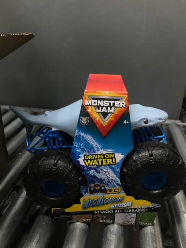 Photo 2 of Monster Jam Official Megalodon Storm All-Terrain Remote Control Monster Truck 